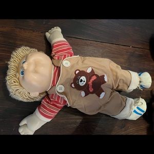 Vintage cabbage patch boy with glasses.